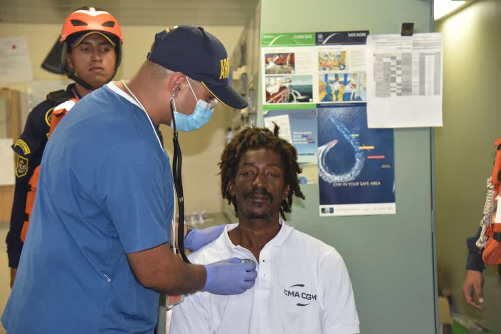 Castaway Elvis Francois is attended by Colombian Navy members after he was rescued near the department of La Guajira, in the extreme north of Colombia (Colombian Navy press office via AP/PA)