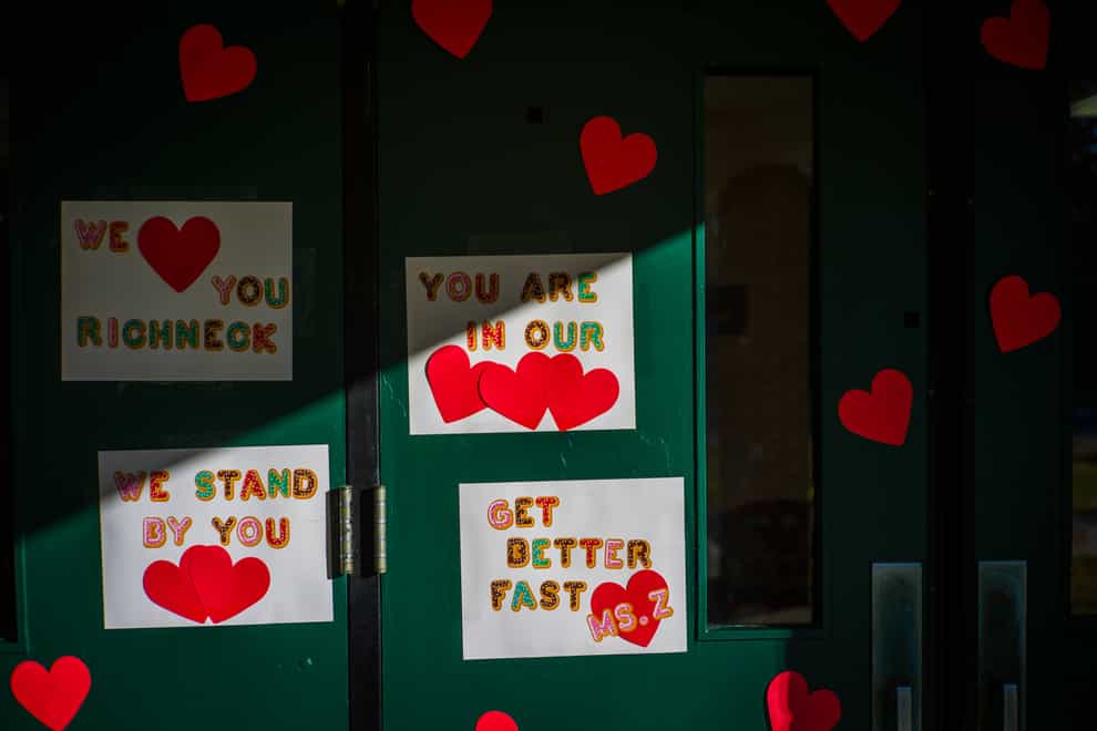 Messages of support for teacher Abby Zwerner, who was shot by a six-year-old pupil, grace the front door of Richneck Elementary School (John C Clark/AP)