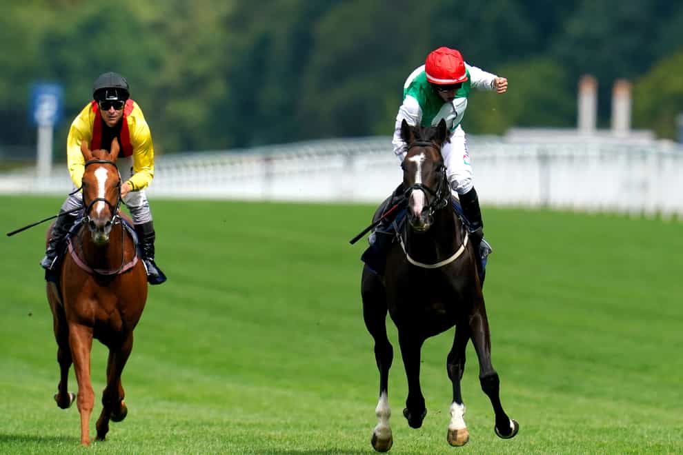 Jockey Patrick Joseph “P.J.” McDonald (right) celebrates on Pyledriver after winning the King George VI And Queen Elizabeth Qipco Stakes during the QIPCO King George Meeting at Ascot Racecourse. Picture date: Saturday July 23, 2022. (John Walton/PA)