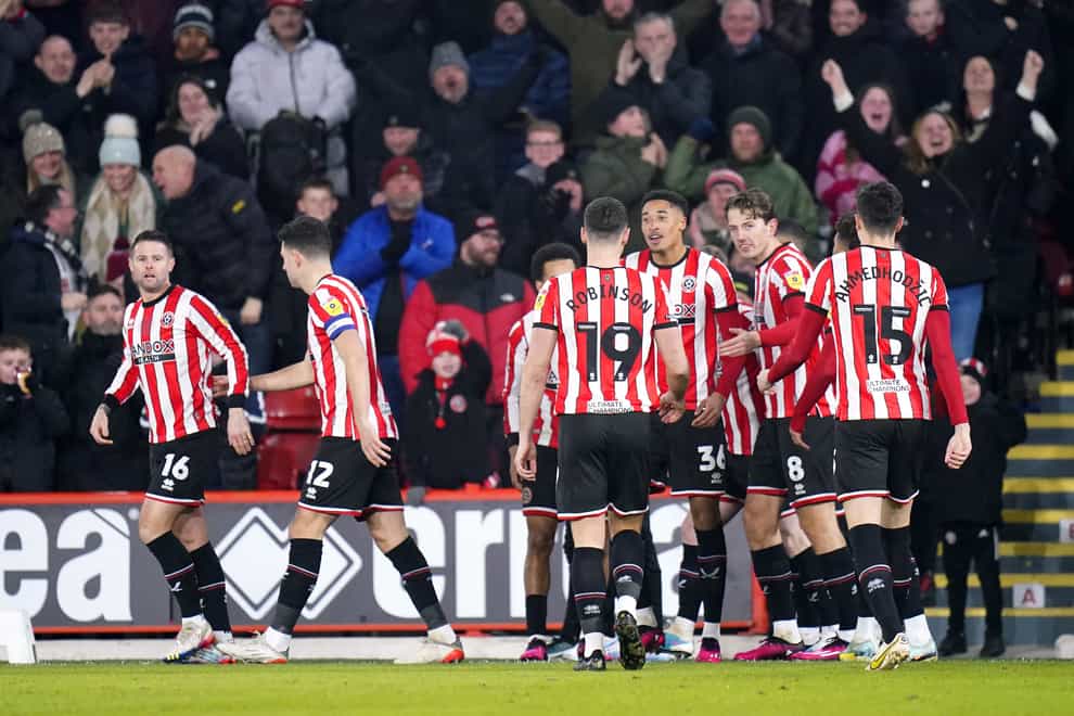 Sheffield United’s Daniel Jebbison celebrates with his team-mates after scoring (Danny Lawson/PA).