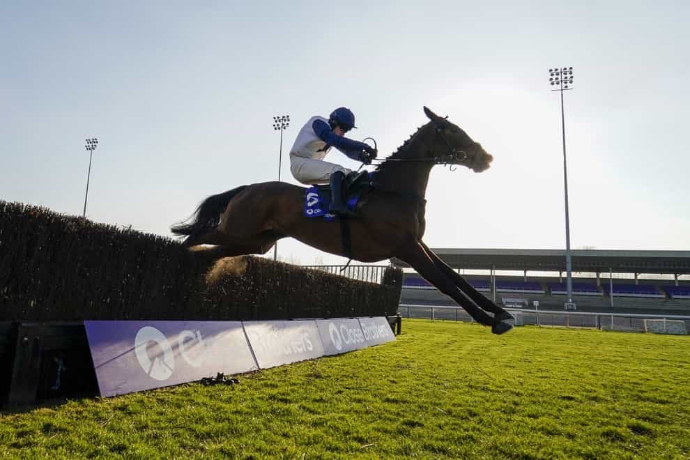 Clondaw Castle ridden by Jonathan Burke clears the last to win The Close Brothers Handicap Chase during the Close Brothers Chase Day at Kempton Park Racecourse. Picture date: Saturday February 27, 2021.