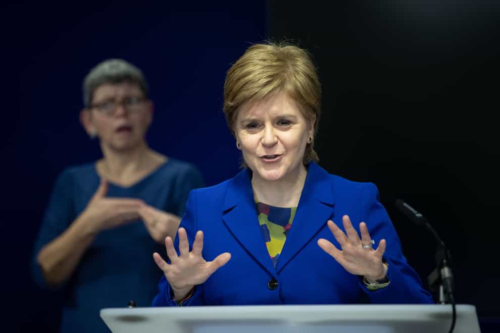 Nicola Sturgeon has condemned some of the placards on display at a rally protesting against the blocking of new gender laws (Lesley Martin/PA)