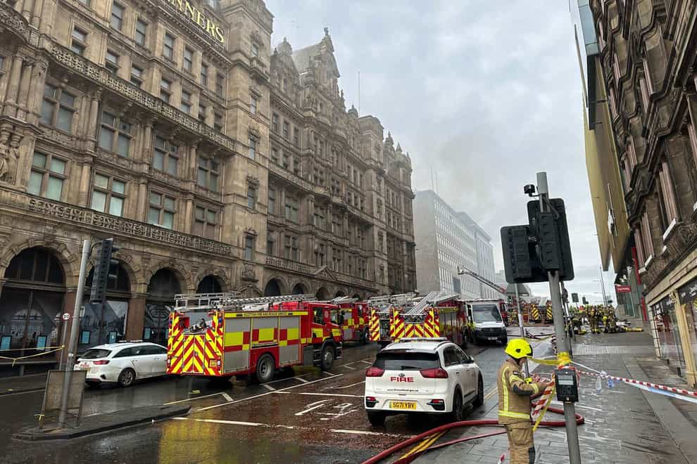 Fire crews in attendance outside the Jenners building in Edinburgh (Dan Barker/PA)