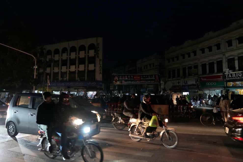 Much of Pakistan was left without power on Monday as an energy-saving measure by the government backfired (KM Chaudary/AP)