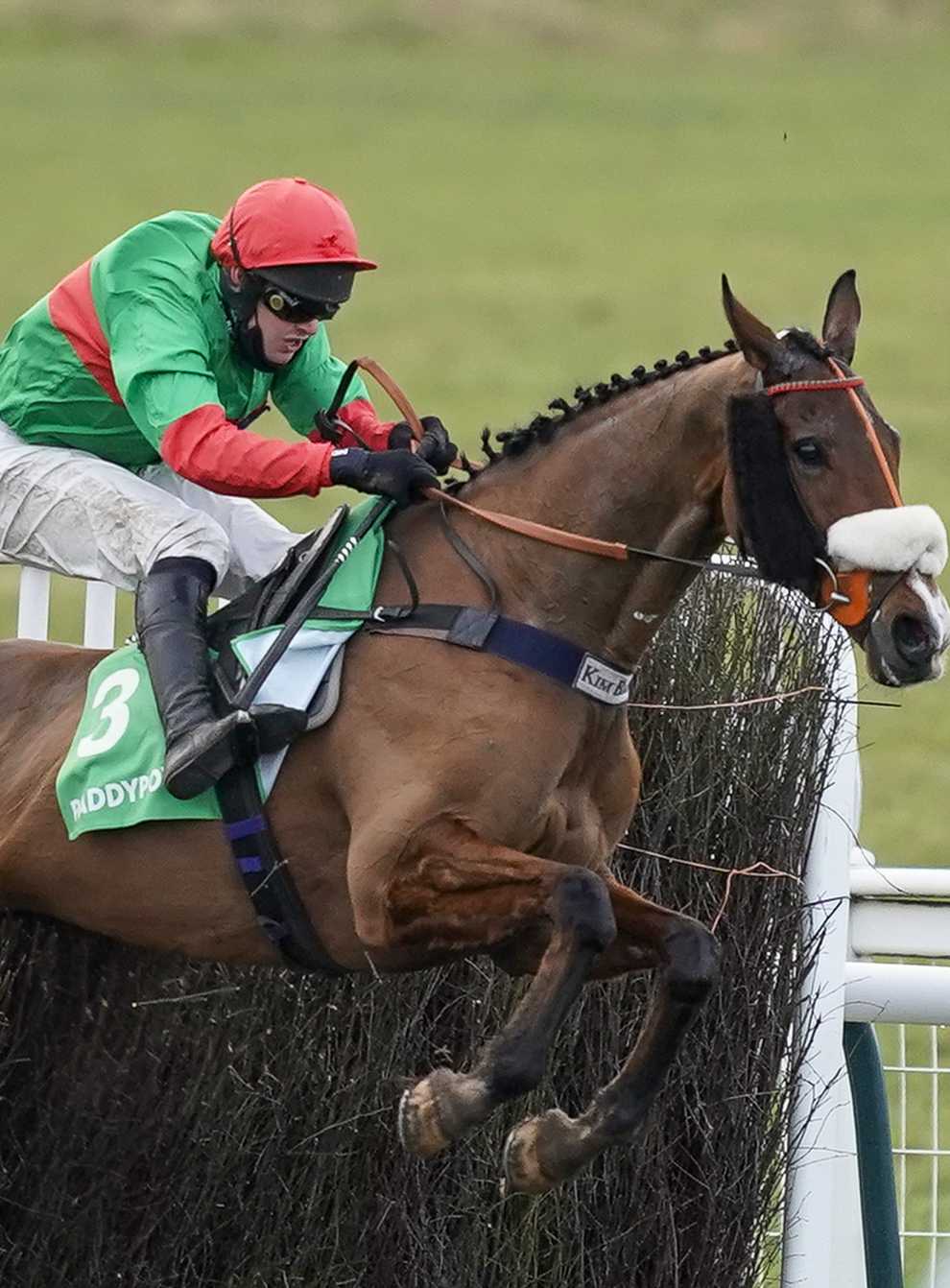 Kim Bailey is unsure what to do next with Two For Gold, here, clearing the last to win The Paddy Power Warwick Castle Handicap Chase at Warwick (Alan Crowhurst/PA)