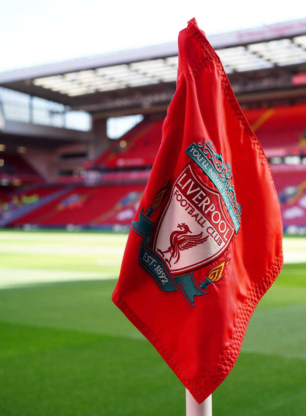 Three men have been arrested for alleged homophobic chanting at Anfield (Peter Byrne/PA)