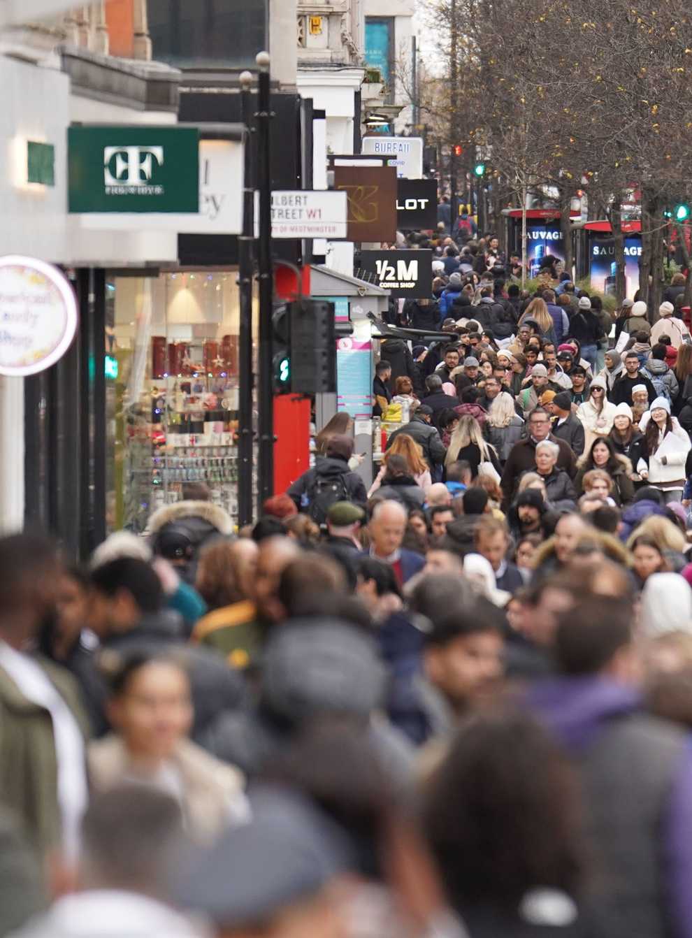 Footfall in retail destinations strengthened over the year while the importance of online spending diminished (James Manning/PA)