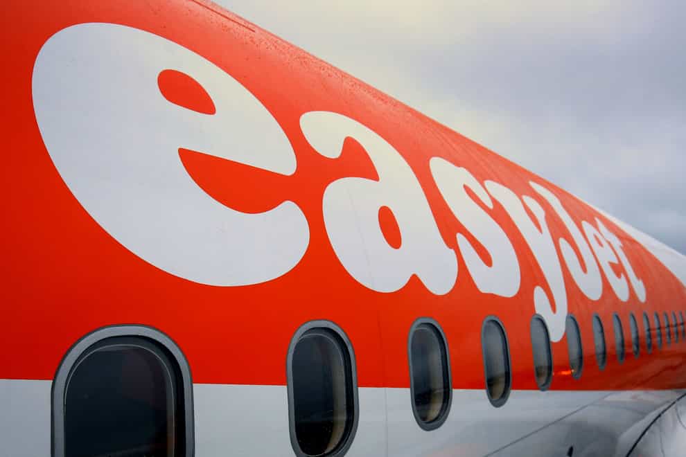 Budget airline easyJet has hiked its full-year profit outlook after trimming losses in its first quarter and cheering a record surge in bookings since the start of the year (Gareth Fuller/PA)