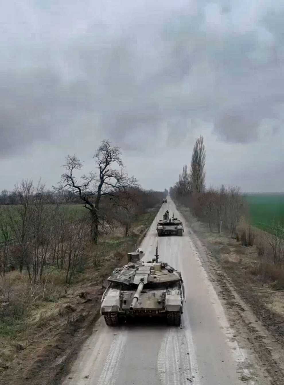 Russian army T-90M tanks roll into position at an undisclosed location in Ukraine (Russian Defence Ministry Press Service/AP)