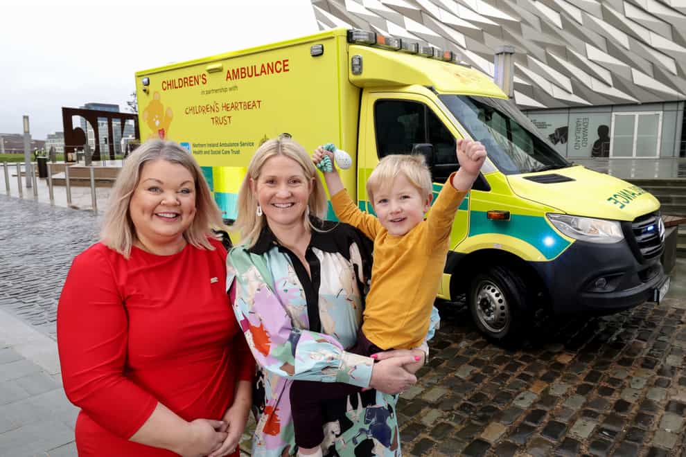 (l to r) Joanne McCallister, Edel McInerney and her son Fionn at the launch of Northern Ireland’s first children’s ambulance (William Cherry/Presseye/PA)