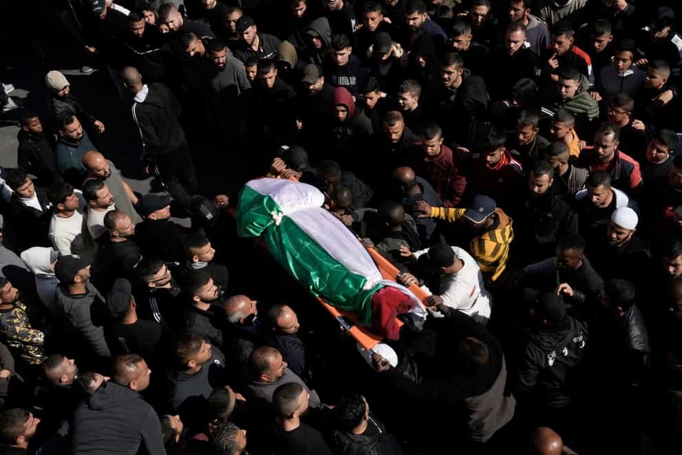 Nine Palestinians have been killed during an Israeli military raid in the occupied West Bank – the deadliest single raid in two decades (Majdi Mohammed/AP)
