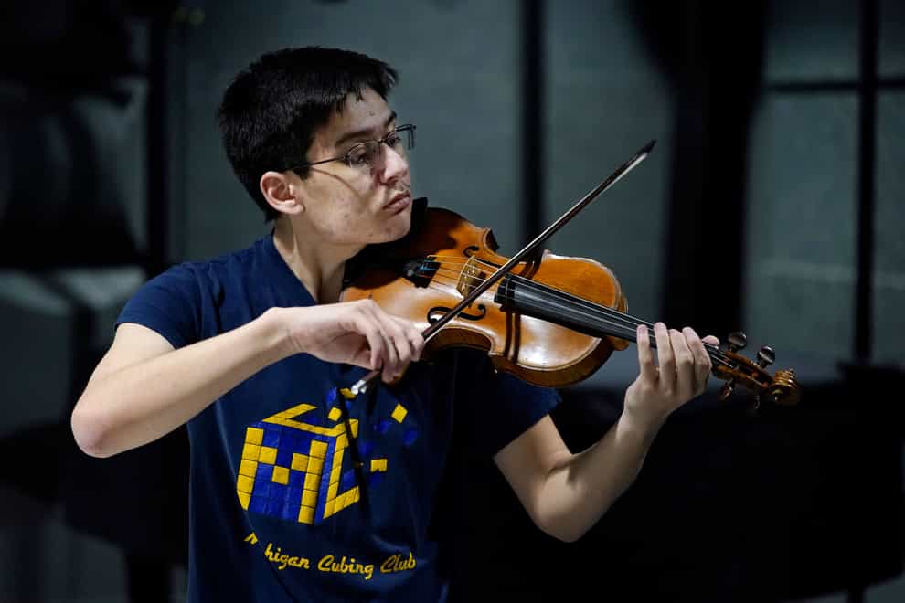 University of Michigan student Stanley Chapel performs one of Johann Sebastian Bach’s violin sonatas from memory (Carlos Osorio/AP)