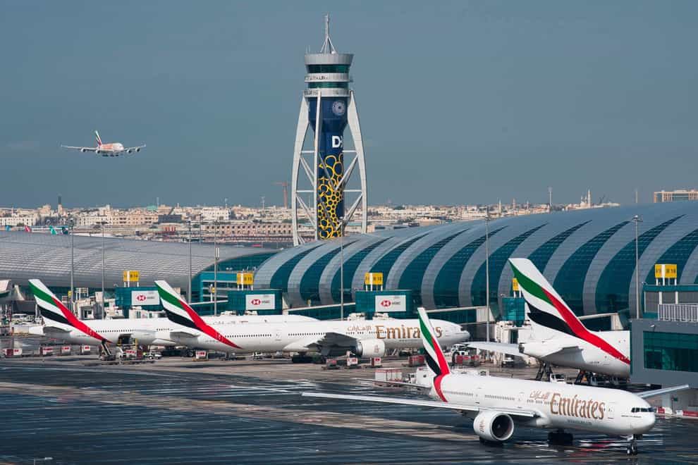 An Emirates plane comes in to land at Dubai International Airport (Jon Gambrell/AP)