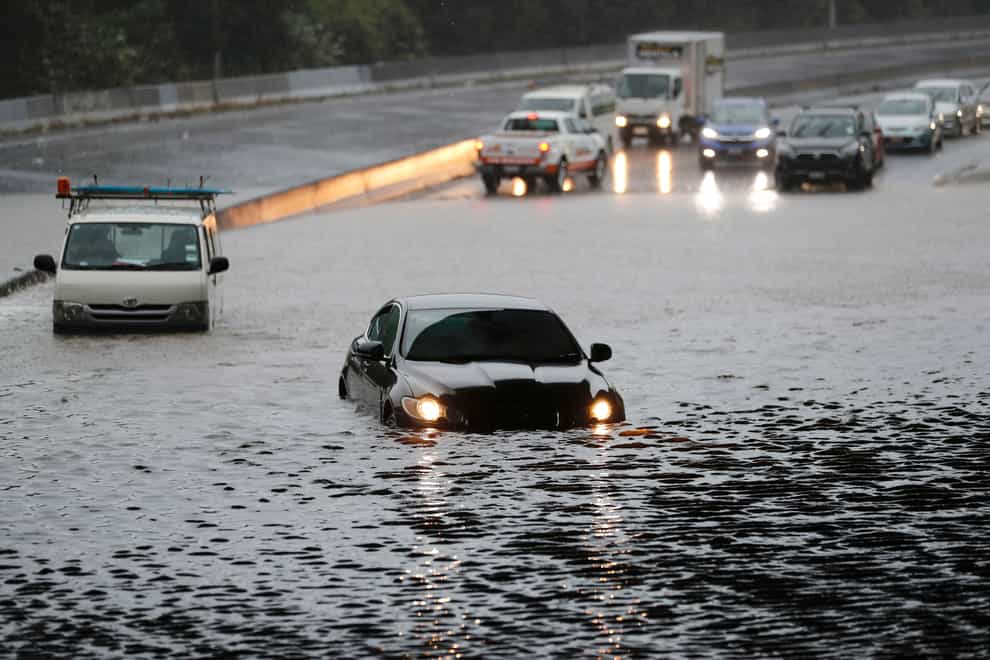 Record levels of rain have pounded Auckland, New Zealand’s largest city, causing widespread disruption (Dean Purcell/New Zealand Herald/AP)
