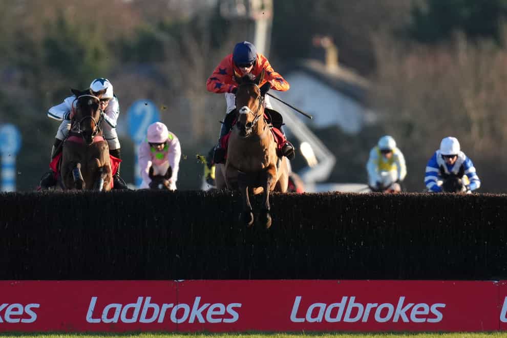 Bravemansgame ridden by Harry Cobden goes on to win The Ladbrokes King George VI Chase during day one of the Ladbrokes Christmas Festival at Kempton Racecourse, Sunbury-on-Thames. Picture date: Monday December 26, 2022. (John Walton/PA)