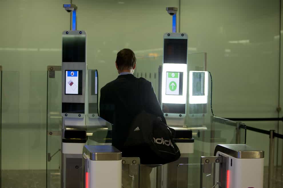 Families with young children could be boosted with quicker journeys through airports this summer under moves to expand the use of electronic passport gates (Steve Parsons/PA)