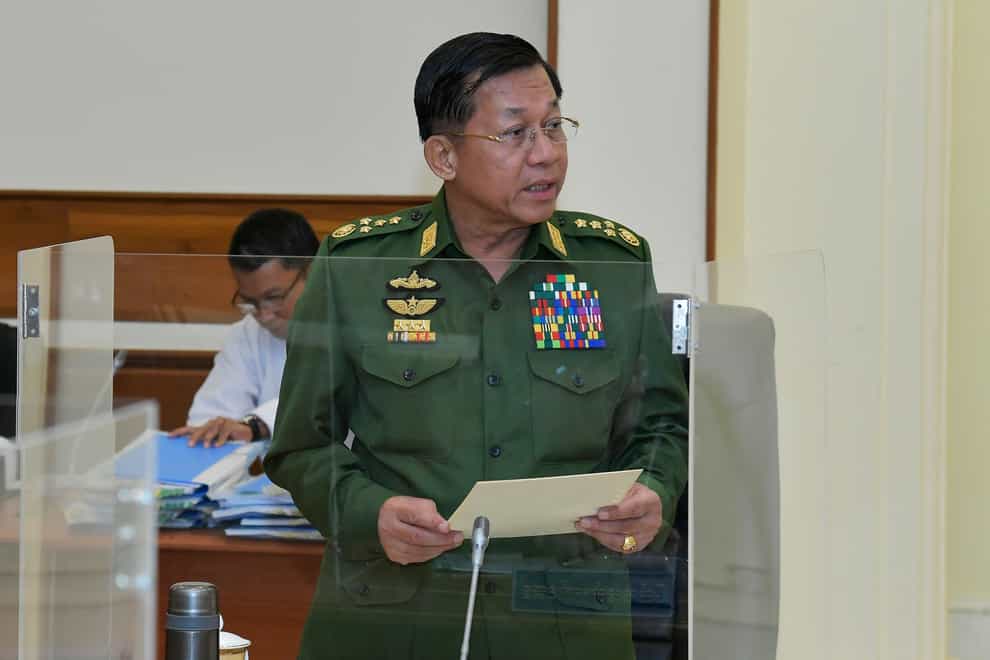 Gen Min Aung Hlaing talks during the National Defence and Security Council meeting (The Military True News Information Team via AP)