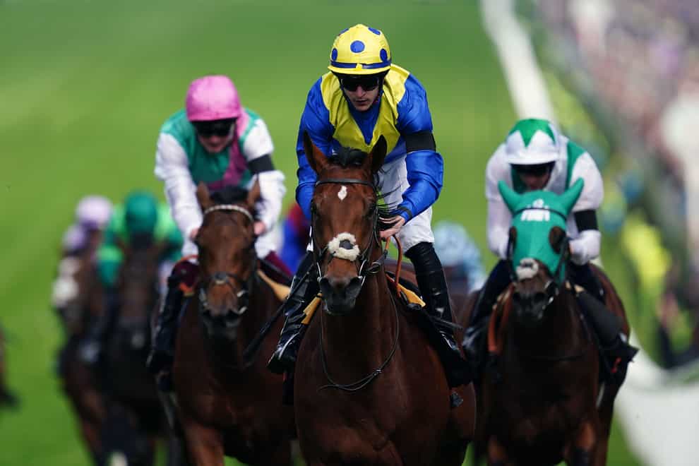 Desert Crown ridden by jockey Richard Kingscote on their way to winning the Cazoo Derby (In Memory of Lester Piggott) on Derby Day during the Cazoo Derby Festival 2022 at Epsom Racecourse, Surrey. Picture date: Saturday June 4, 2022. (David Davies/PA)