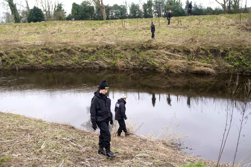 Police officers search near the River Wyre in St Michael’s on Wyre, Lancashire, as police continue their search for missing woman Nicola Bulley, 45, who was last seen on the morning of Friday January 27, when she was spotted walking her dog on a footpath by the nearby River Wyre. Picture date: Saturday February 4, 2023.