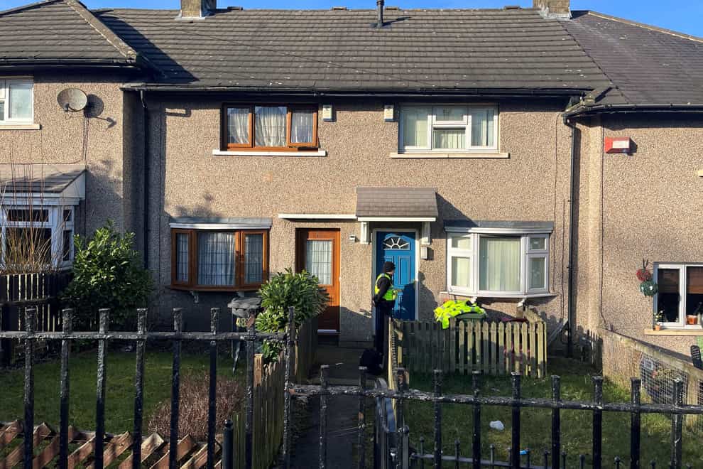 Police at a property in Walpole Road, Huddersfield (Kate Dickinson/PA)