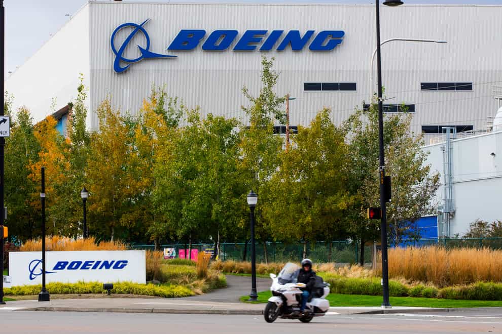 Boeing is cutting about 2,000 jobs in finance and human resources (Ellen M. Banner/The Seattle Times via AP, File)