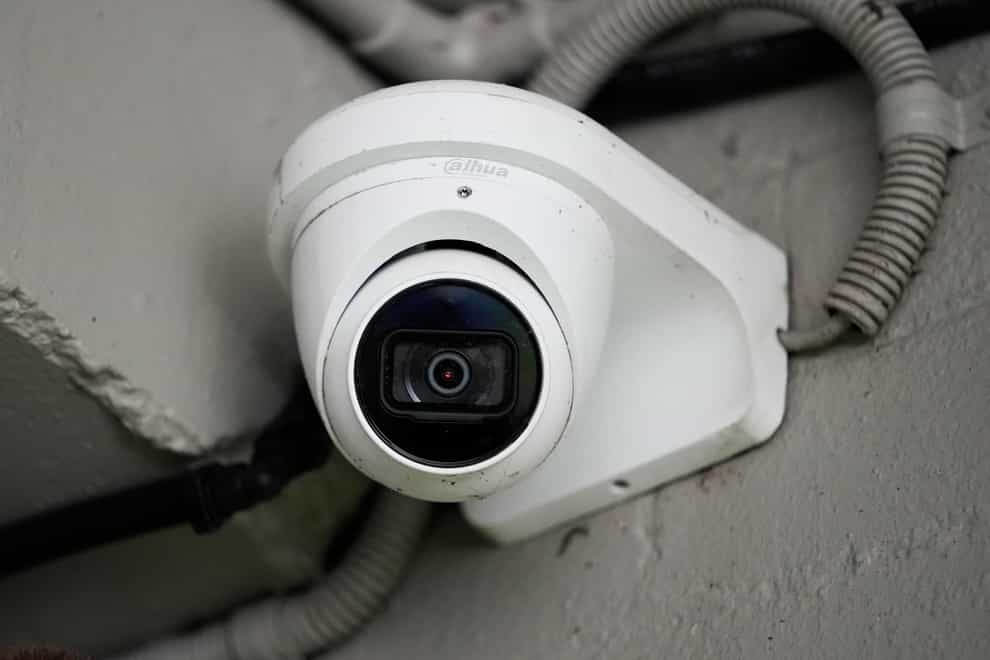 A Chinese Dahua brand security camera in Sydney, Australia (Mark Baker/AP)
