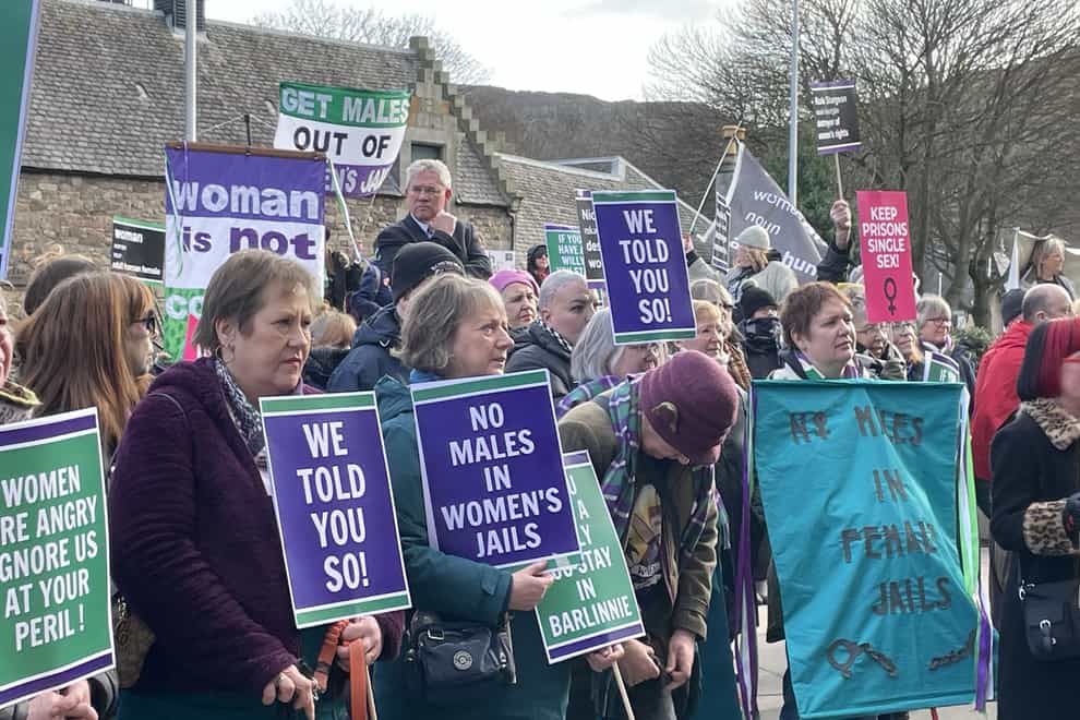 Campaigners from For Women Scotland protest outside Holyrood (PA)