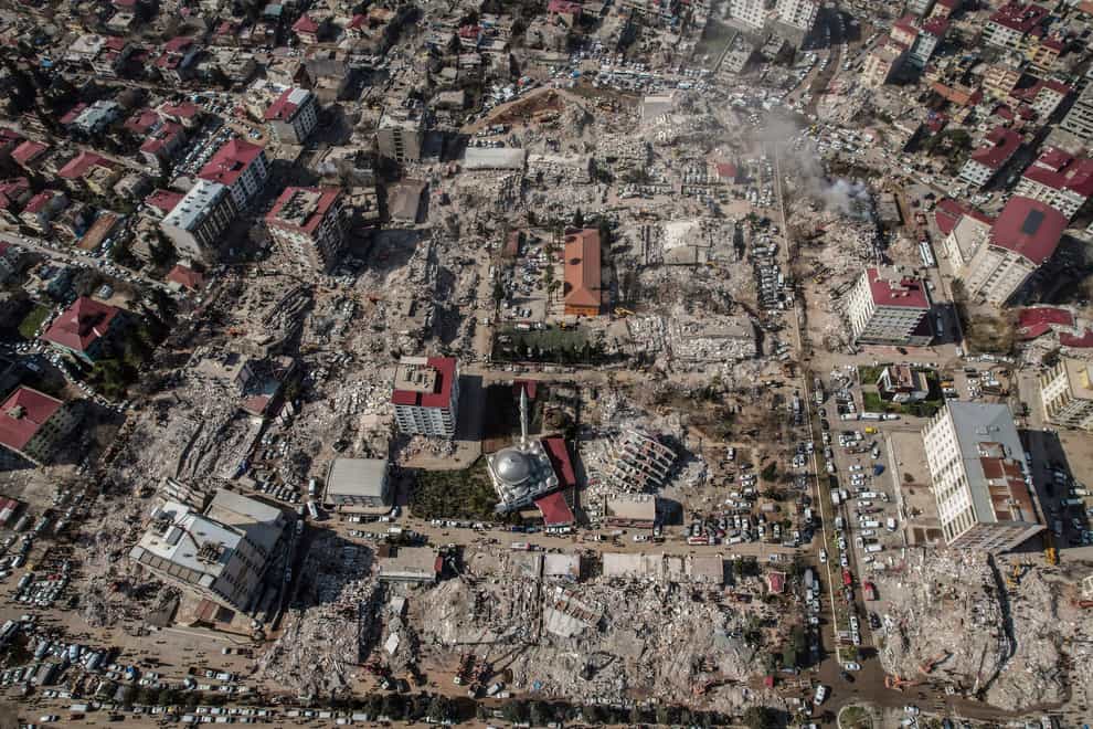 Aerial photo showing the destruction in a city in southern Turkey (IHA via AP)