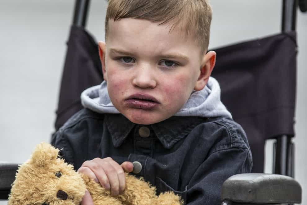 Six-year-old Daithi MacGabhann outside Hillsborough Castle in Northern Ireland, after he and his family met with Northern Ireland Secretary Chris Heaton-Harris to discuss delays implementing new organ donation laws in the region (Liam McBurney/PA)