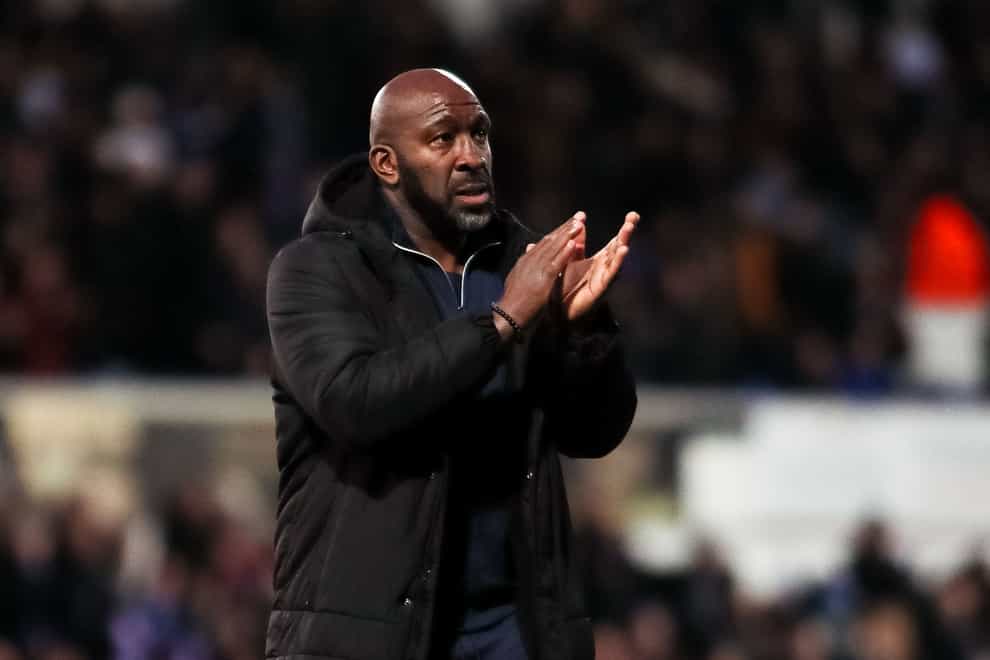 Sheffield Wednesday manager Darren Moore applauds the fans at the end of the Sky Bet League One match at Portman Road Stadium, Ipswich. Picture date: Saturday February 11, 2023.