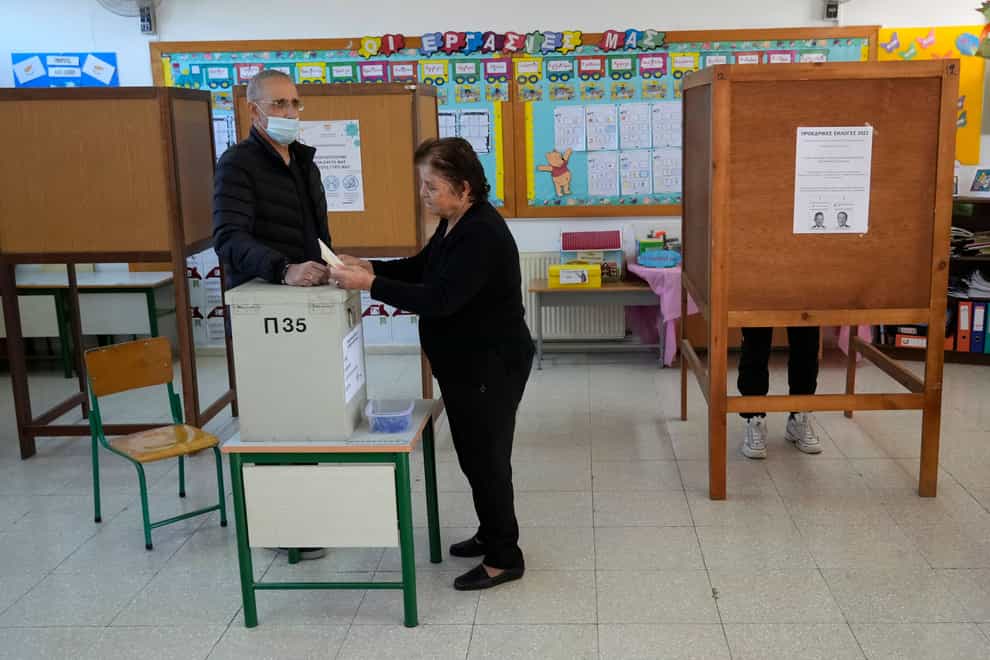 Voting has started in a run-off to elect ethnically split Cyprus’s eighth new president, pitting a former foreign minister who campaigned as a unifier eschewing ideological and party divisions against a popular veteran diplomat Petros Karadjias/AP)