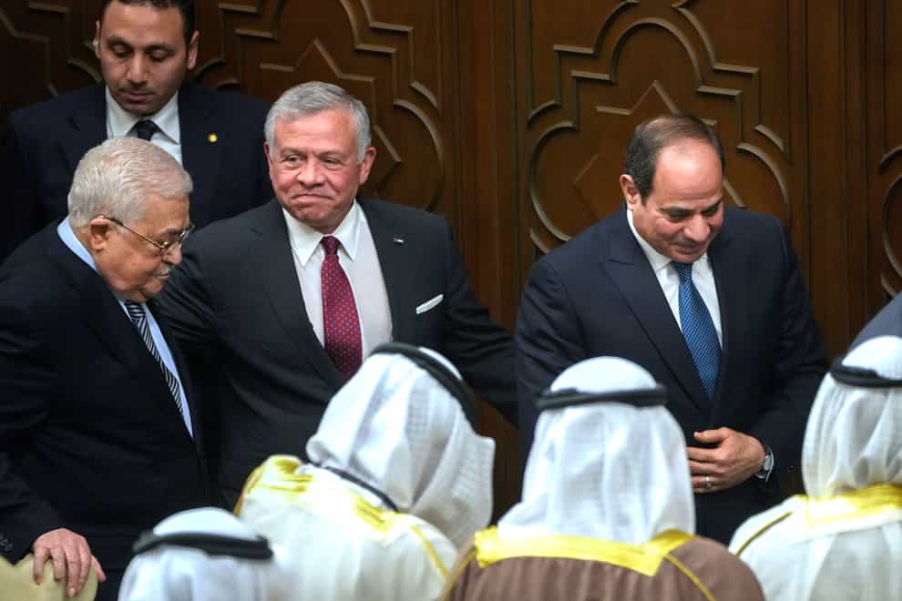 Egyptian President Abdel-Fattah el-Sissi, right, Palestinian President Mahmoud Abbas, left, and King Abdullah II of Jordan, leave a conference to support Jerusalem at the Arab League headquarters in Cairo (AP Photo/Amr Nabil)