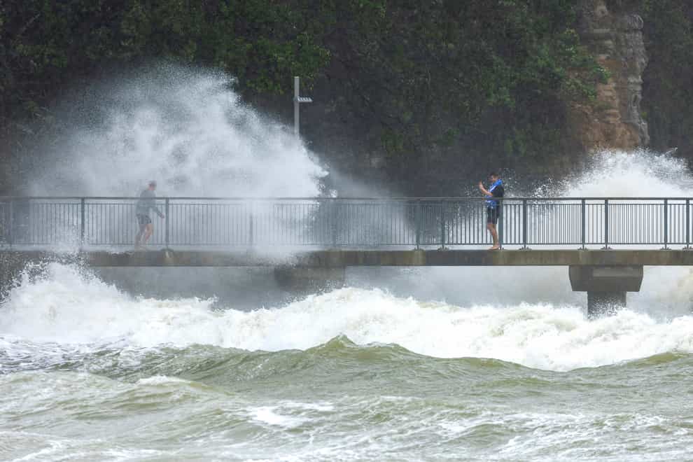 Auckland residents hunkered down on Monday as they braced for a deluge from Cyclone Gabrielle (Brett Phibbs/NZ Herald/AP)