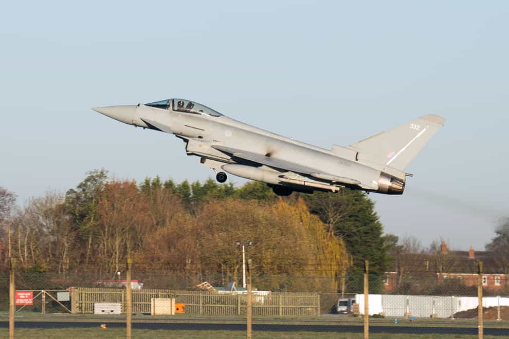 A Typhoon takes off from RAF Coningsby in Lincolnshire (Joe Giddens/PA)