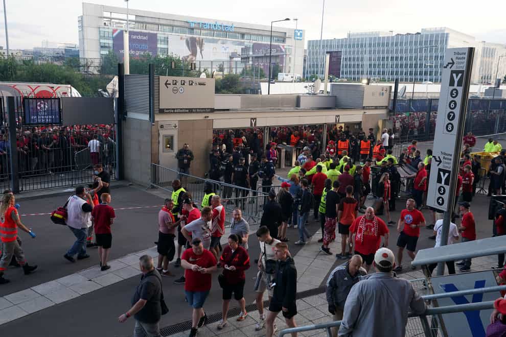 Fans waiting outside the Stade de France gates ahead of the Champions League final (Nick Potts/PA)