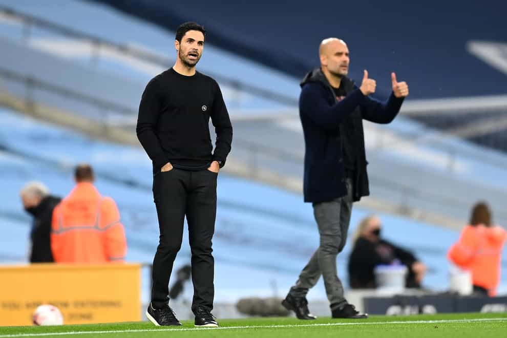 Arsenal manager Mikel Arteta (left) was previously Pep Guardiola’s assistant at Manchester City (Michael Regan/PA)