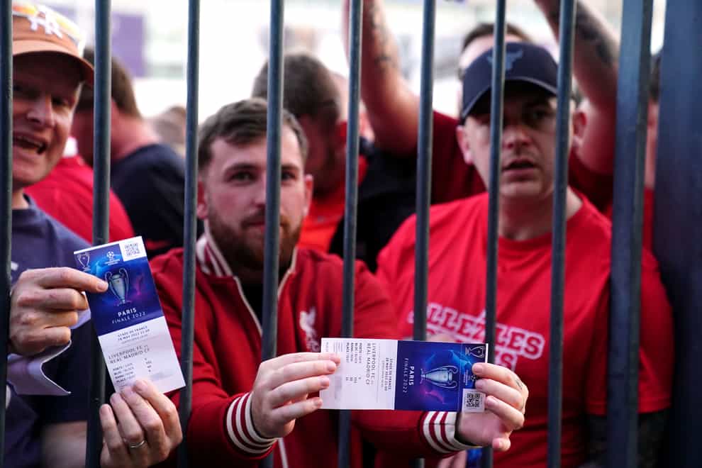 Liverpool fans stuck outside the ground show their match tickets ahead of the Champions League Final against Real Madrid at the Stade de France (Adam Davy/PA Images).