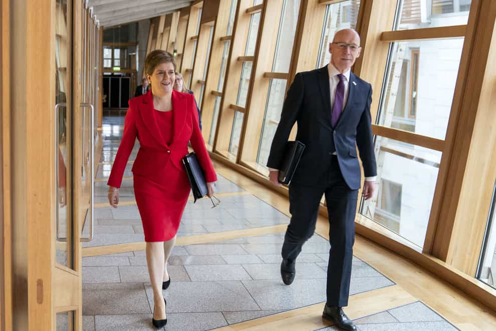 John Swinney with First Minister Nicola Sturgeon (Jane Barlow/PA)