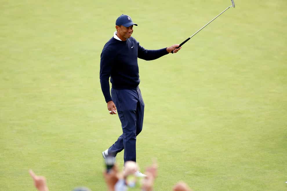 Tiger Woods marked his return to competitive action with a closing trio of birdies as he carded 69 during the first round of the Genesis Invitational (Ryan Kang/AP)
