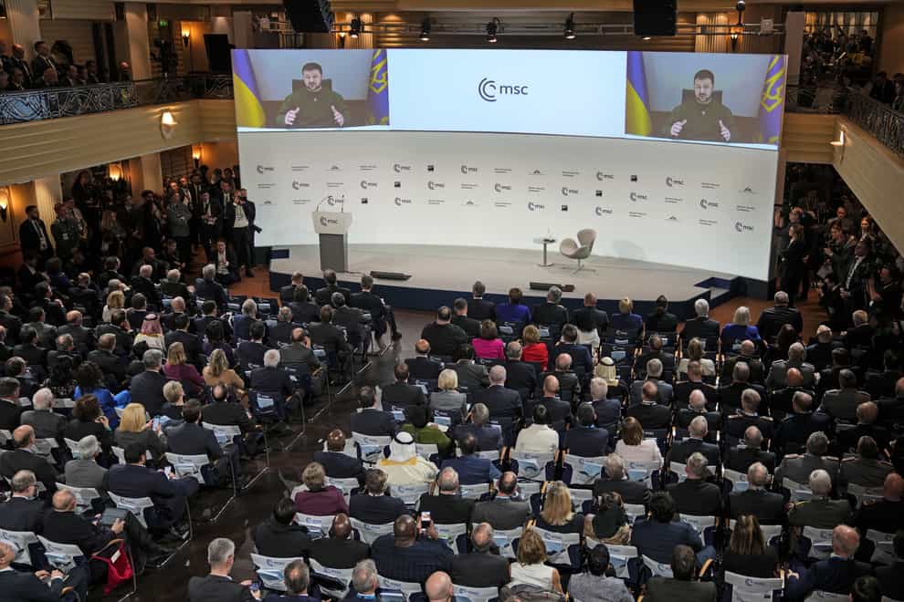 President Volodymyr Zelensky speaks from a screen at the Munich Security Conference (Michael Probst/AP/PA)