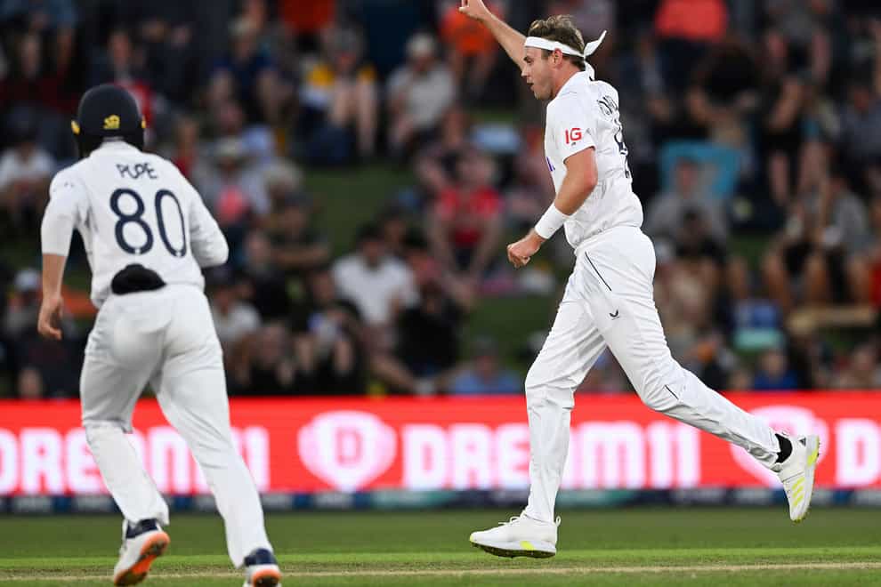 Stuart Broad, right, celebrates the wicket of New Zealand’s Devon Conway (Andrew Cornaga/Photosport via AP)