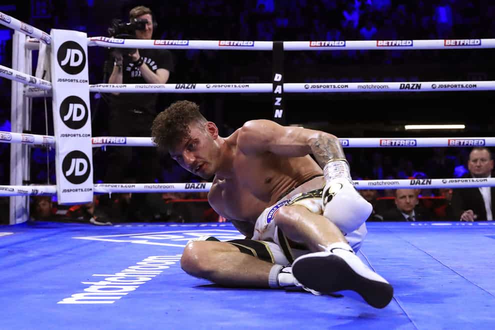 Leigh Wood was stopped in the seventh round of his WBA featherweight world title fight against Mauricio Lara (Bradley Colyer/PA)