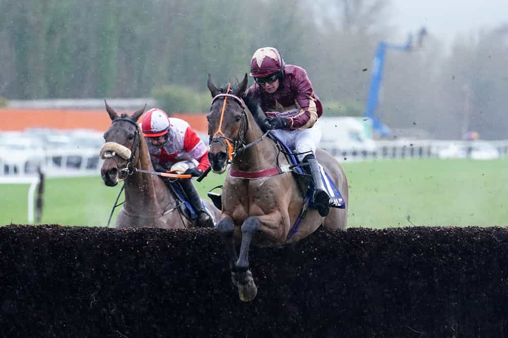 The Two Amigos ridden by David Prichard clears a fence before going on to win the Coral Welsh Grand National Handicap Chase at Chepstow Racecourse, Monmouthshire (David Davies/PA)