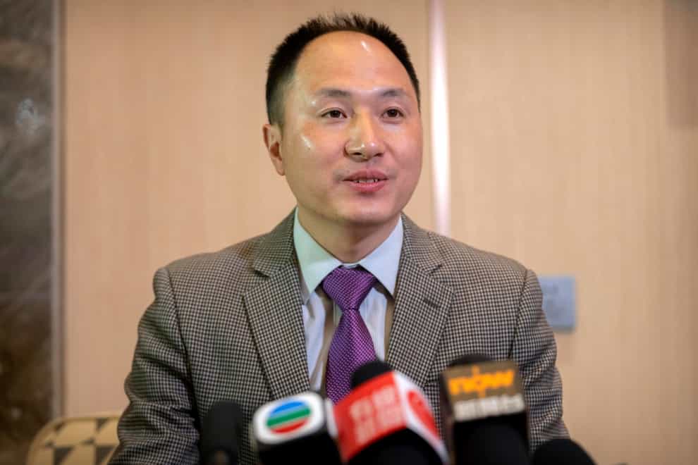 Chinese scientist He Jiankui speaks at a brief press conference in Beijing (Mark Schiefelbein/AP)
