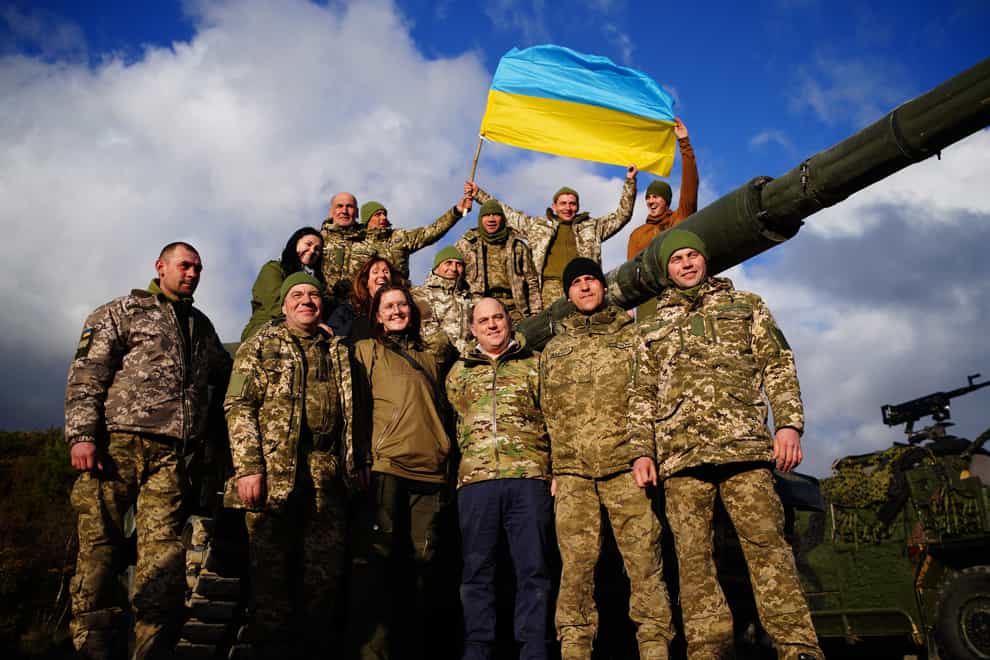 Defence Secretary Ben Wallace, centre right, met Ukrainian soldiers training at an Army base in the South West (Ben Birchall/PA)