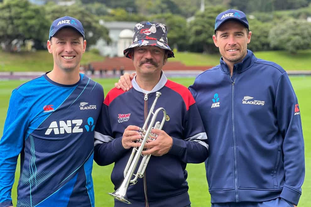 Barmy Army trumpeter Simon Finch (centre) with Tim Southee (right) and Matt Henry. (New Zealand Cricket/Handout)