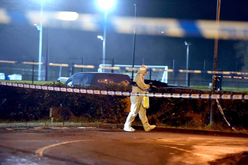 A forensics officer at the scene of the shooting in Omagh (Oliver McVeigh/PA)