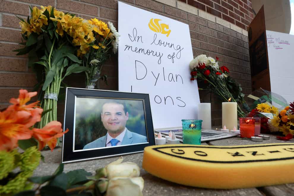 A makeshift memorial to honour TV reporter Dylan Lyons (Joe Burbank /Orlando Sentinel via AP)