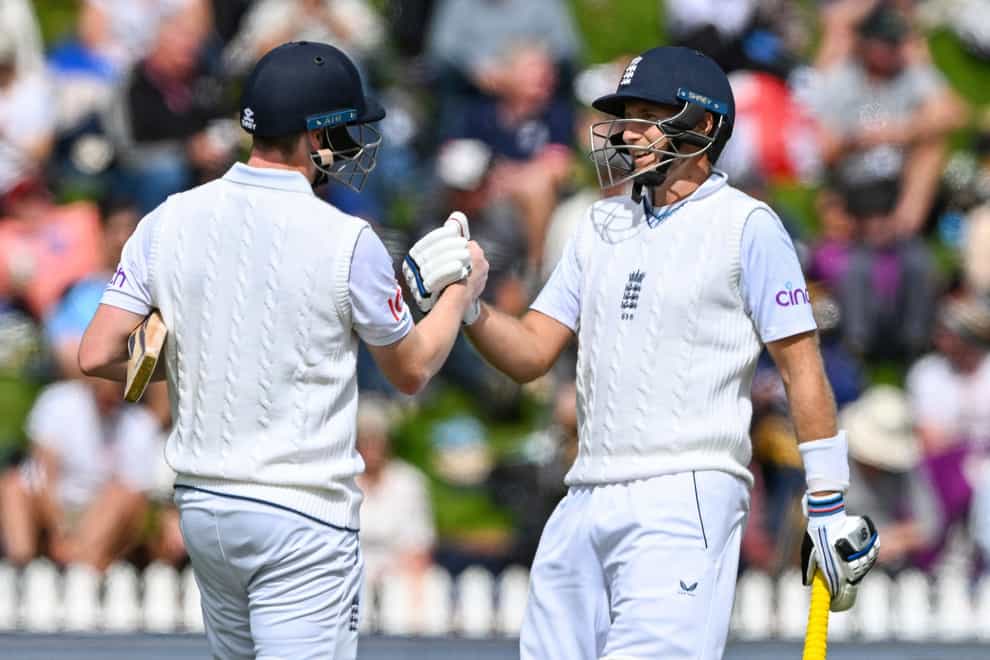 Joe Root, right, and Harry Brook ensured day one ended with England on top (Andrew Cornaga/AP)