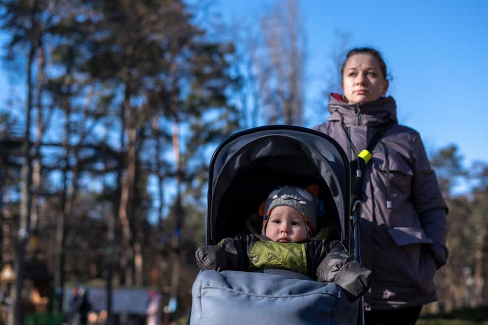 Anastasiia Morhun, 29, with her one-year-old son Roman, born on February 24, 2022 in Kyiv, Ukraine (Hanna Arhirova/AP/PA)